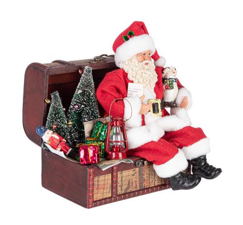Babbo natale nel baule con doni