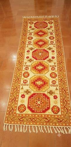 Tappeto Chain Stitch lana bordo arancio con arabeschi rossi 76x215