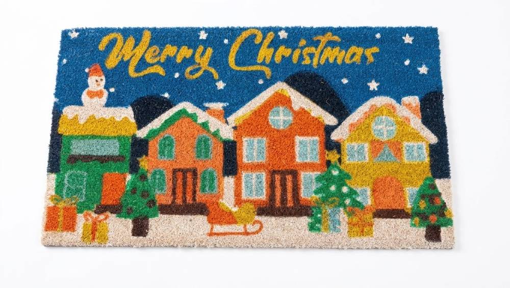 Zerbino Merry Christmas Villaggio Natale cocco sfondo blu case arancio con slittino 70x40